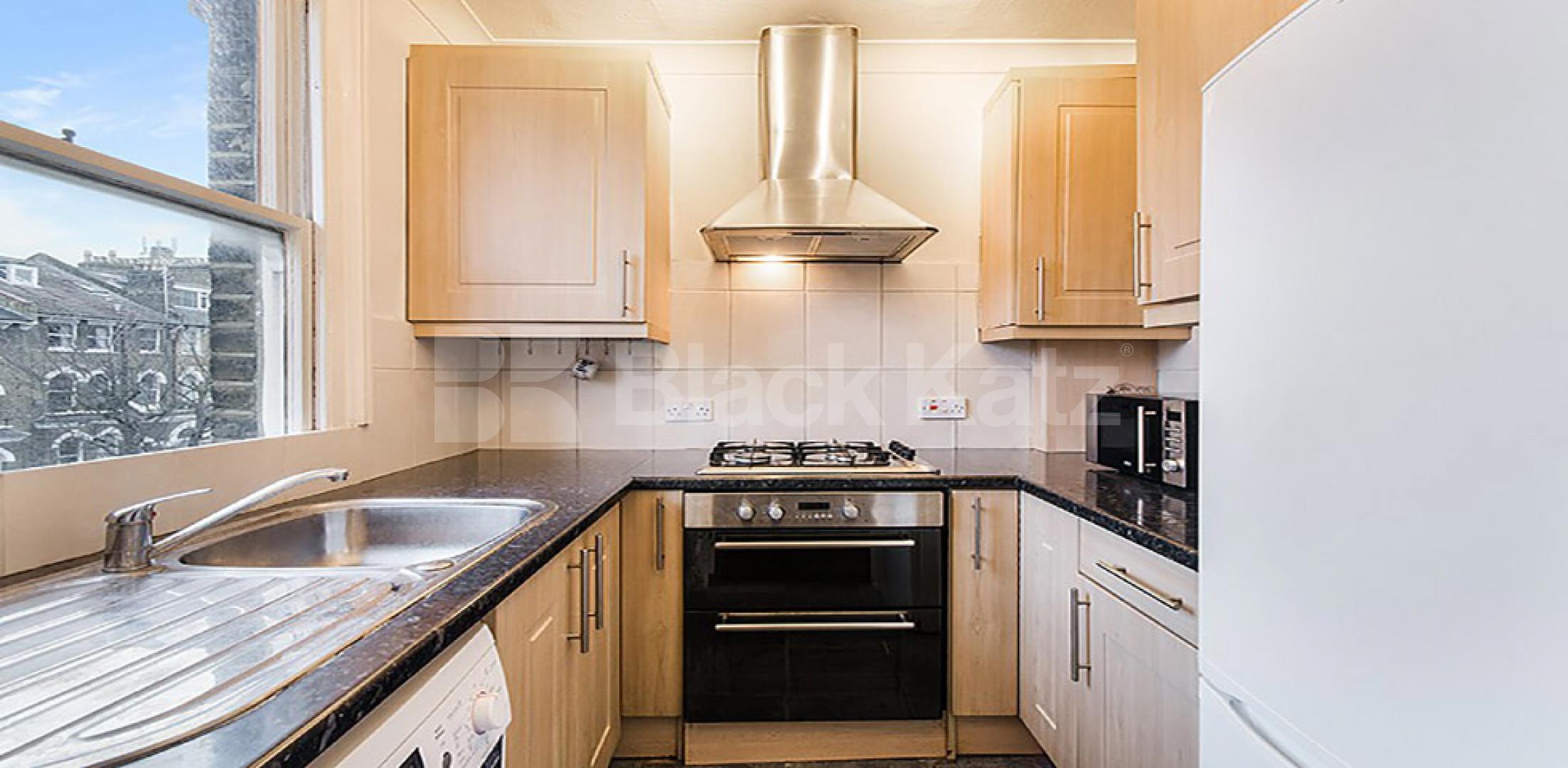 Two bedroom flat set within a period house in Camden South Villas, Camden Square